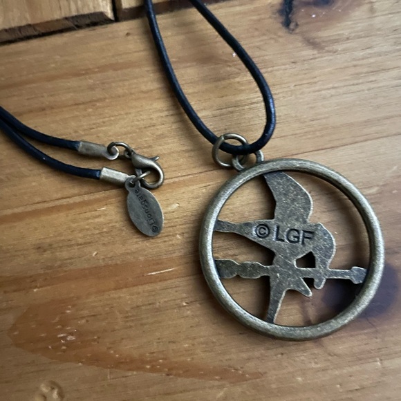 The Hunger Games Mocking Jay pendant stamped hunger games and lions gate. 18” - Picture 6 of 6